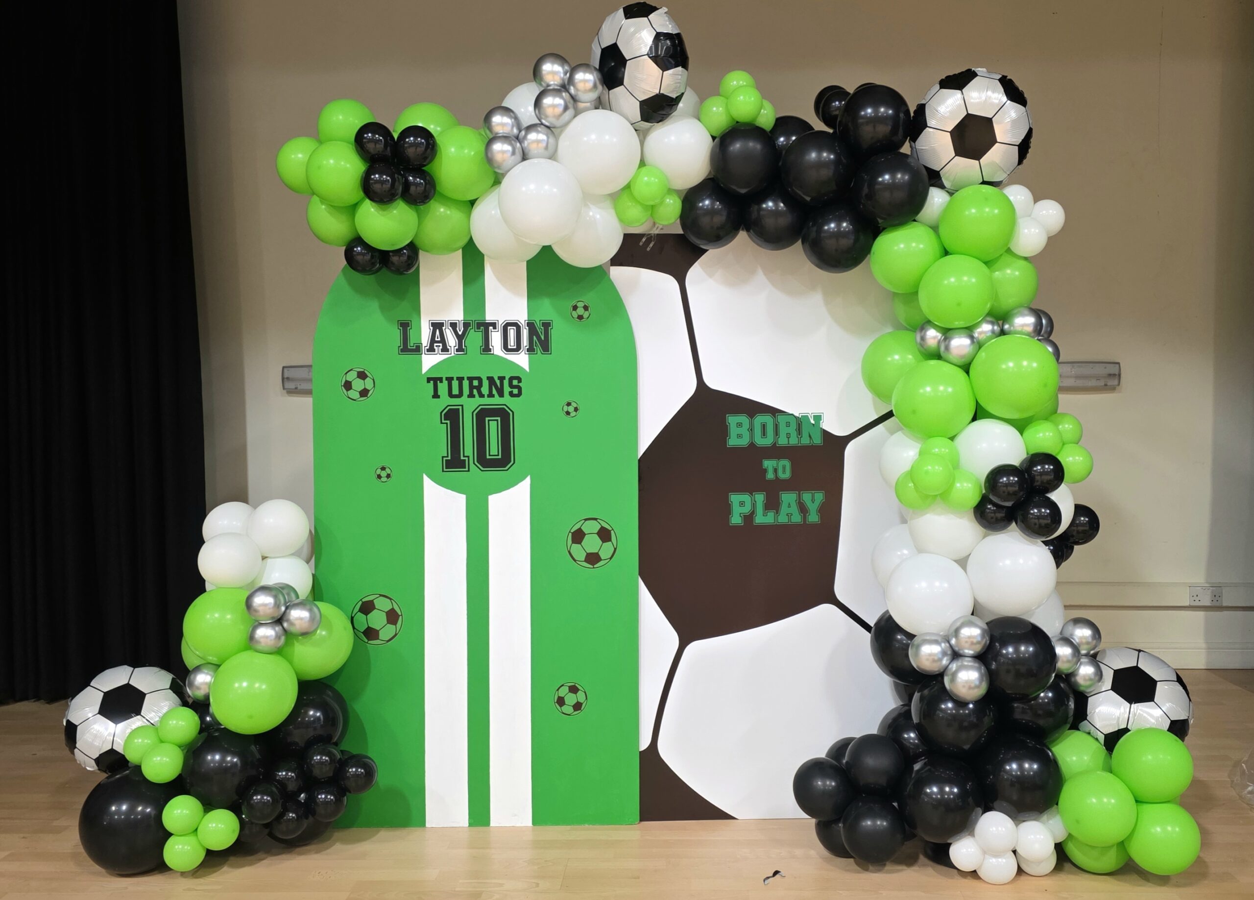 Football party plinth balloon display as part of a football themed birthday event in London